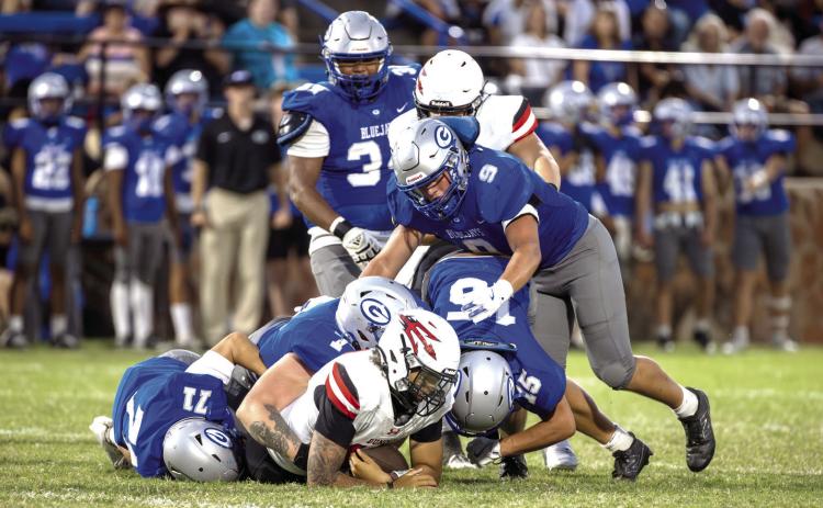 Guthrie defender Gamble Smith tackles a Duncan ball carrier during the Bluejays' 42-10 win Sept. 12.
