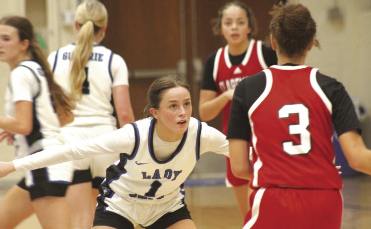 Guthrie's Oliviah Bryan plays defense during game vs. Claremore, Friday, Jan. 31. Photo by George McCormick.