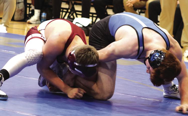 Bryson Hall in action against Blackwell’s Lawson Lusk on January 11.