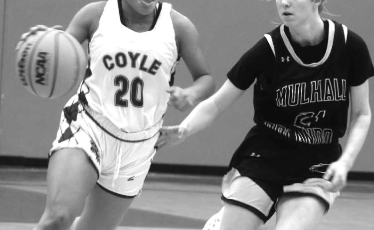 Coyle’s Arianna Vasquez drives around Lady Panthers Emily Parsons.