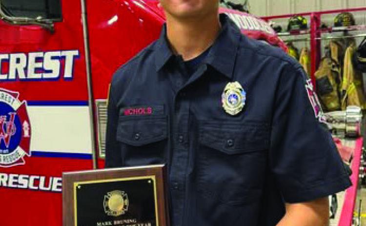 Cole Nichols receives the Mark Bruning Firefighter of the Year Award for 2025. Photo courtesy of Woodcrest Fire Department.