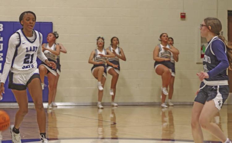 Ania Morgan brings ball up the court against El Reno.