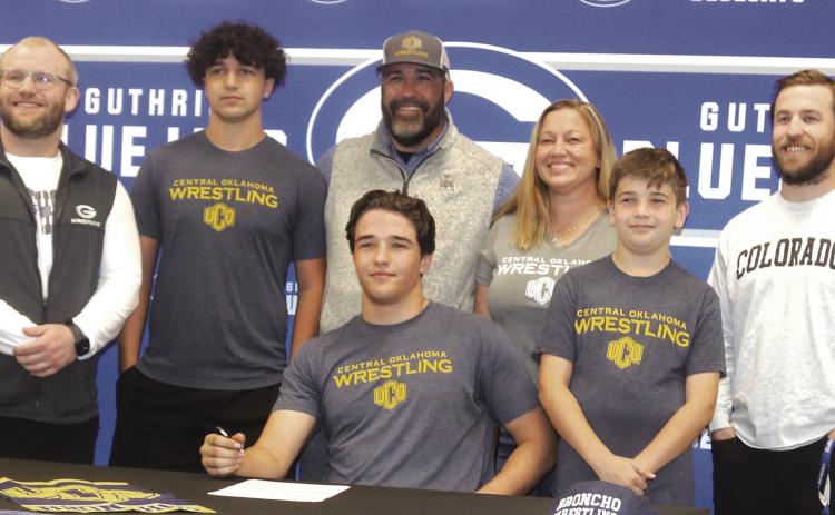 Guthrie senior Wesley Silvis signed a Letter of Intent on May 9 to wrestle at University of Central Oklahoma next year. Silvis will wrestle at 197 pounds for the Bronchos. Silvis finished 24-7 this past season and a fourth place finish at 190 pounds in the Class 5A State Tournament. Silvis plans to major in kinesiology. Silvis is the son of Shawn and Lyndsey Silvis. Photo by Mike Monahan