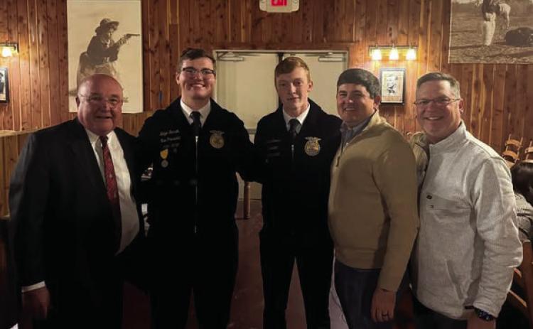 Dr. Mike Simpson, Representative John Pfeiffer and Senator Chuck Hall with Guthrie FFA students, Ridge Garrett and Colton Stevens. Photo submitted