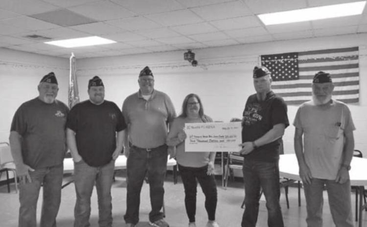 Jennifer Duncan representative from Nestle’ PURINA presenting a $4000.00 donation to the Guthrie VFW Post 4578 for needed building repairs and upgrades.