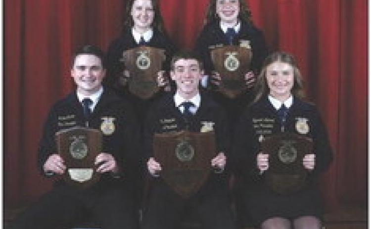 Coy Davidson (front center) of the Elgin FFA Chapter won first place in the agriscience division of the state FFA speech contest during the 2024 Oklahoma FFA Interscholastics on May 3. Jacob Mannen (front left) of the Fletcher FFA Chapter, Kynseth Zubrod of the Guthrie FFA Chapter, Faith Wright (back left) of the Stratford FFA Chapter and Katelee Martin of the Alva FFA Chapter placed second through fifth, respectively.