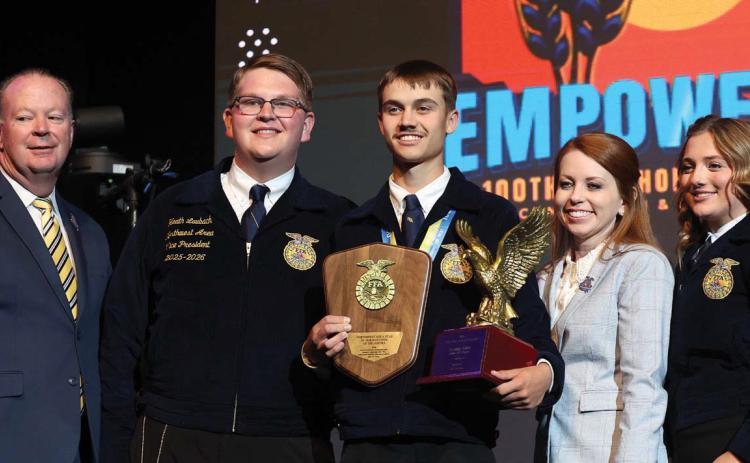 Zachary Allen (center) of the Guthrie FFA Chapter accepts the FFA State Star in Agribusiness award at the 100th Oklahoma FFA Convention and Expo on May 6 at the BOK Center in Tulsa, Oklahoma. Congratulating Allen are Scott Nemecek (left), state FFA advisor; Heath Laubach, 20252026 Oklahoma FFA northwest area vice president; Jacey Fye, Oklahoma FFA Foundation executive director; and Darla Fesmire, 2025-2026 Oklahoma FFA reporter. Photo courtesy of the Oklahoma FFA Association