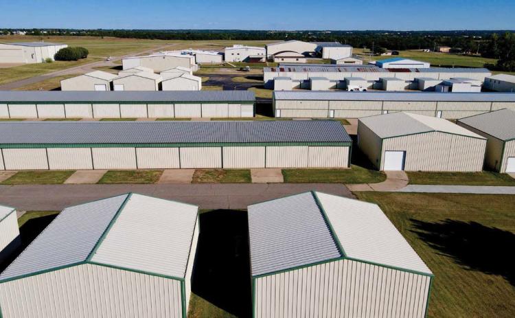 A row of hangars houses a portion of the more than 130 aircraft based at Guthrie-Edmond Regional Airport.