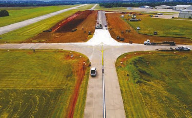 Aerial view of construction at a new taxiway intersection at the Guthrie-Edmond Regional Airport.