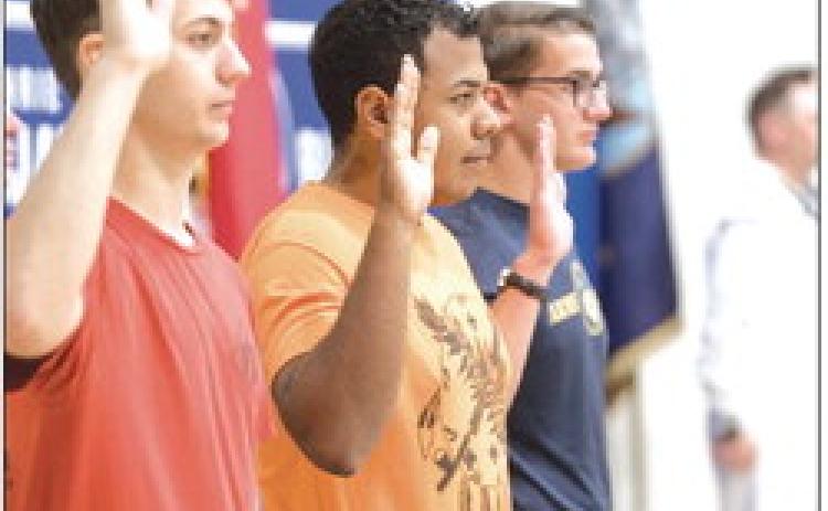 Guthrie High School students taking oath. Photo by Brent Fuchs