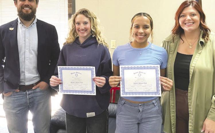 Pictured with Chloe and Ayreona is Trey Woods with Hoboken Coffee and Rotary President, Coy McPeek.
