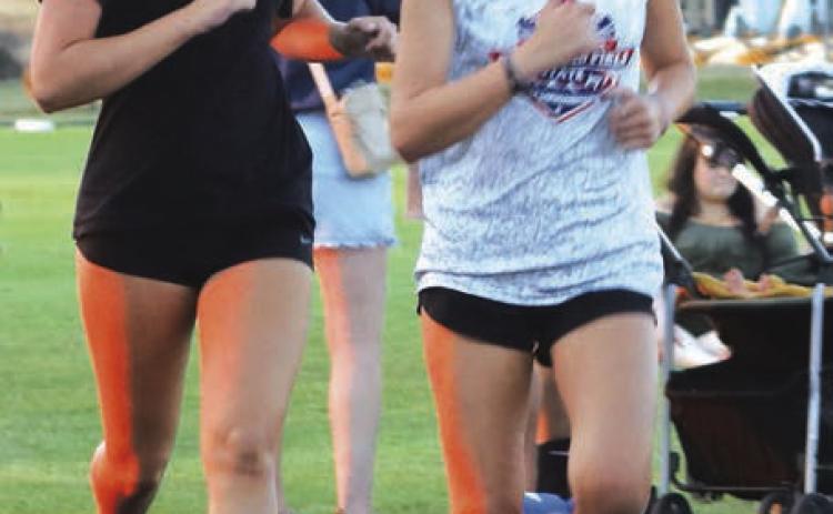 GHS Sophomore Taylor Schroder leads the way at Guthrie Mile Night.
