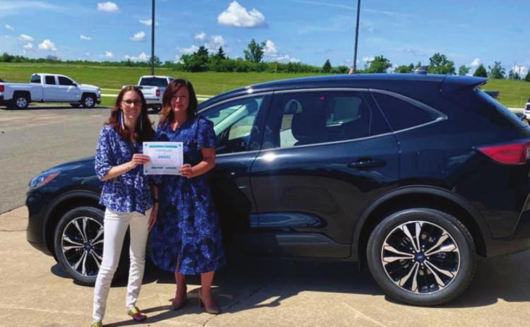 Guthrie Teacher of the Year Kat Jensen claims her summer car at John Vance Auto Group. (Photo provided)