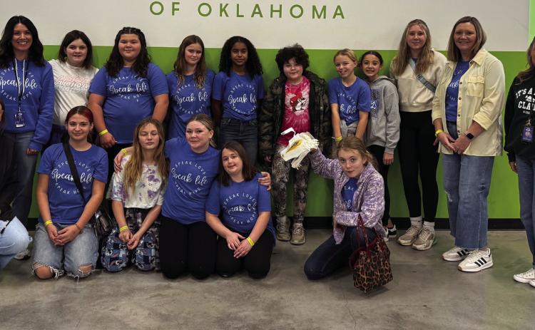 Students in the We Speak Life program at Guthrie Upper Elementary help at the Oklahoma Regional Food Bank, demonstrating their commitment to giving back to the community. Photo submitted