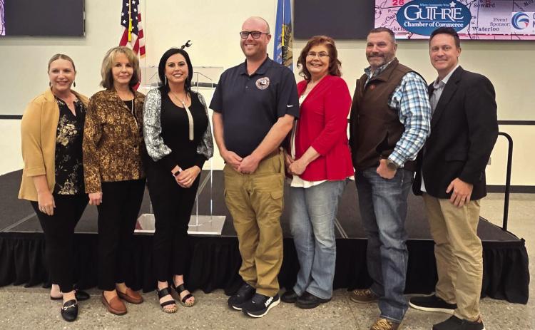 Pictured left to right are Brittany Timmons, Guthrie Chamber of Commerce president; Mary Murphey, County Assessor; Sherri Longnecker, county treasurer; Steven Haga, Logan County Emergency Management director; Troy Cole, County Clerk; Damon Devereaux, sheriff; and Chris Evans, Guthrie Chamber of Commerce Legislative Committee chair. Photo submitted by Brittany Timmons.