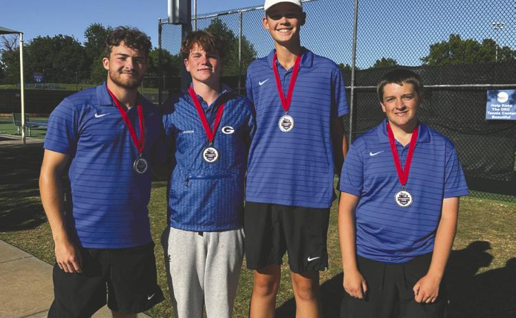 The Guthrie boys tennis team gathers after competing at the Class 5A State Championships, highlighted by a second-place finish from Carson Olmsted and Jaxson Mayer in No. 1 doubles and a fifth-place finish from Drake Shelton and Trenton Edberg in No. 2 doubles. Photo Submitted