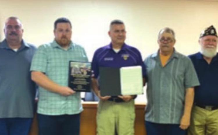 Logan County Commissioners meeting when Purple Heart Award was given