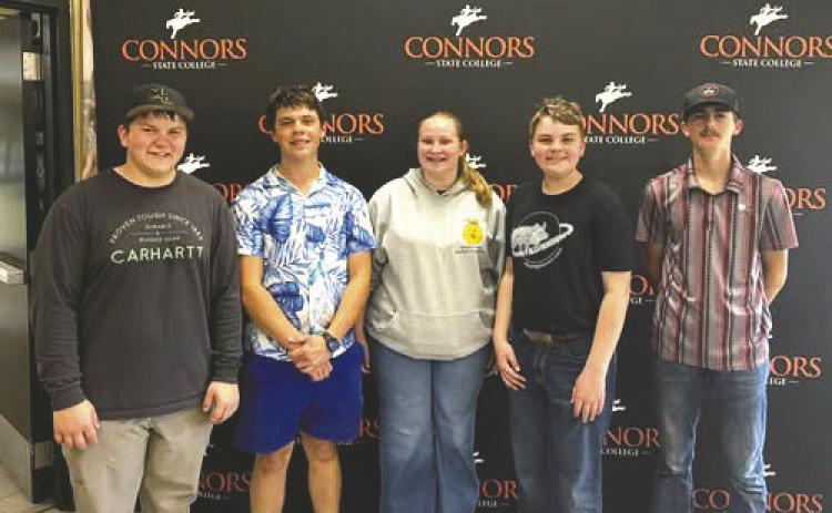 Mulhall-Orlando FFA members Jace Taylor, Fletch Inman, Wade Blagden and Daxton Pack pose with their awards after winning the Farm and Agribusiness Management contest at Aggie Day Interscholastics hosted by Connors State College on April 2. Photo courtesy of Mulhall-Orlando FFA