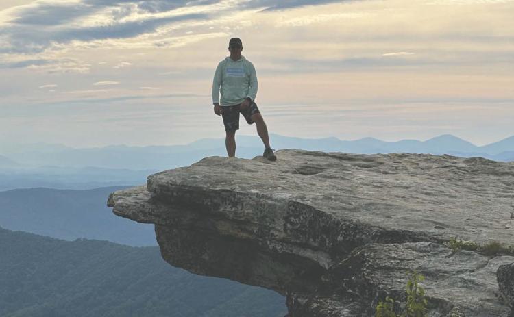 Logan County Undersheriff Troy Dykes stands at McAfee Knob in Virginia during a weekend outing while attending the FBI National Academy in Quantico.