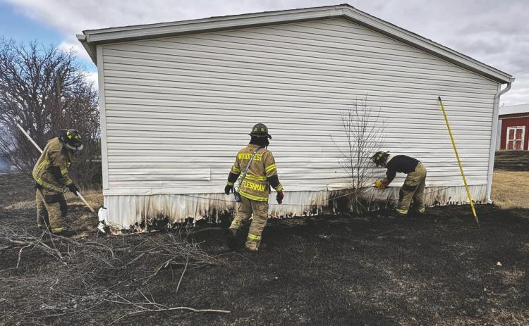 Jan. 14, Woodcrest Fire department firefighters were able to protect two residential homes and two outbuildings. While one small well and pump house were lost, no injuries were reported. WCFD officials praised mutual aid partners for their swift assistance, including Oak Cliff Fire, Sooner Fire and Guthrie Fire. Photo courtesy of Woodcrest Fire Department