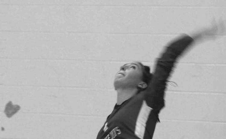 Guthrie Volleyball Cora Leach serving the ball against OBA on October 3.