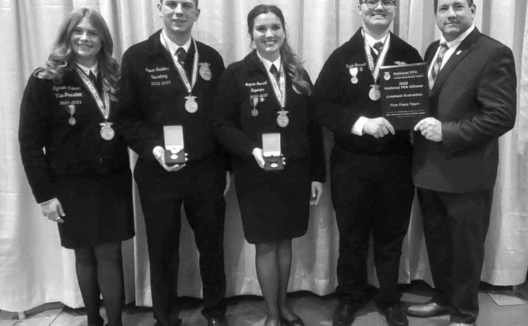 Pictured from Left to Right: Kynseth Zubrod - Gold Emblem award, Steven Sanders - 6th high individual, Maysen Garrett - 1st High individual, Ridge Garrett - Gold Emblem award, Clay Drake - Coach
