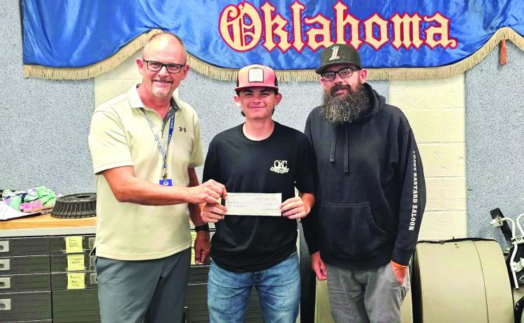 Guthrie Band Director- Rob Blackburn, with band student Tucker Tennill & Bike Night organizer, Ryan Tennill. Photo courtesy of Amber Moore