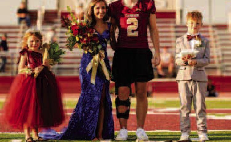 Cashion High School’s 2025-2026 Homecoming Queen Azlynn Thomas and Homecoming King Drew Westerhoff are pictured with Flower Girl Eleanor Edgeman and Crown Bearer Ridge Nichols. Photo by Rylee Broadbent
