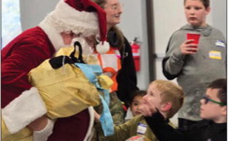 Santa spreads Christmas cheer at the Sibshop.