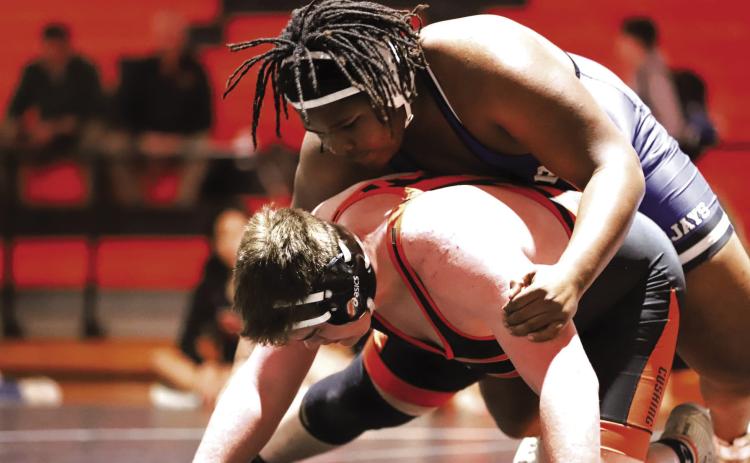 Guthrie's Sir William Morgan wrestles against Cushing on Tuesday, Jan. 28. Courtesy of Nicole Hall, Guthrie Wrestling (Facebook).