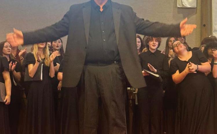 Mr. Perring recieving well deserved applause after directing his final concert as Guthrie High School Choir Director. Photo courtesy of Guthrie Public Schools