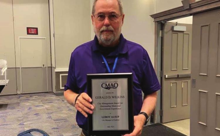 Alsup wins City Management Award for Outstanding Municipal Government Experience at CMAO conference. Picture found on Alsup’s Facebook account