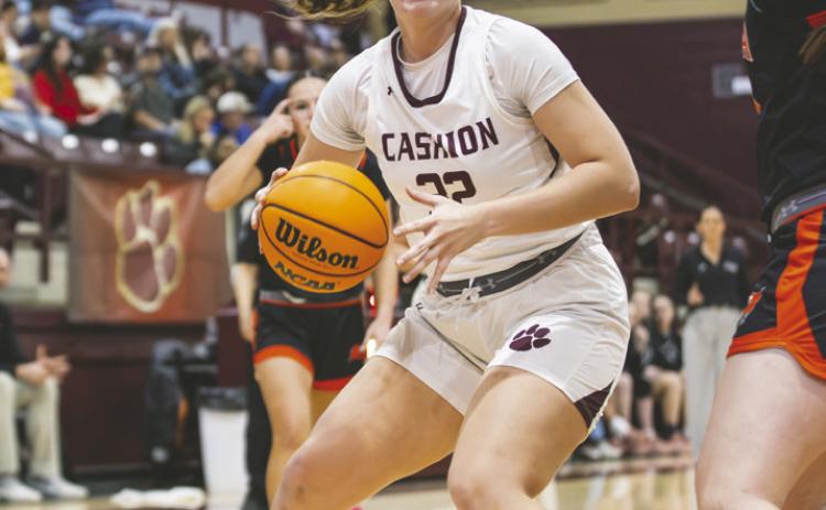Brooke Shafer looks to pass inside against Tonkawa during Cashion’s 63 to15 victory.