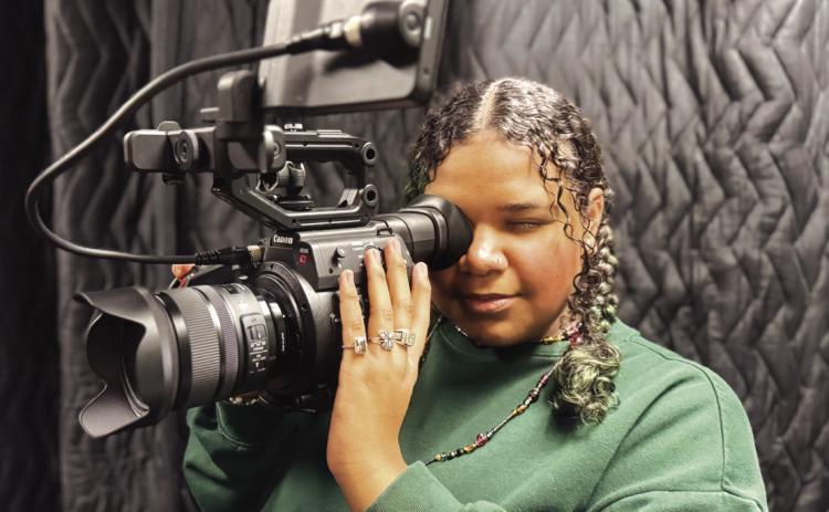 Guthrie High School Junior Jameelah Ramirez explores her creativity behind the camera, filming with professional video equipment in Meridian’s Digital Media program. Submitted photo