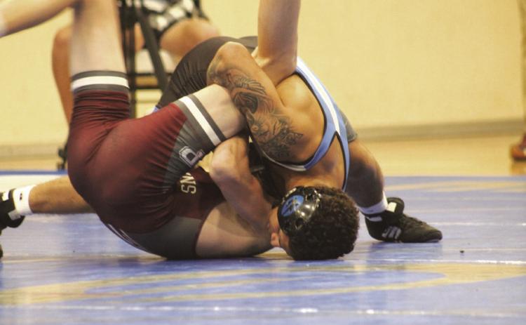 Guthrie's Kaein Herendeen wrestles in the dual against Perry on Dec. 5, 2024. Photo by George McCormick.