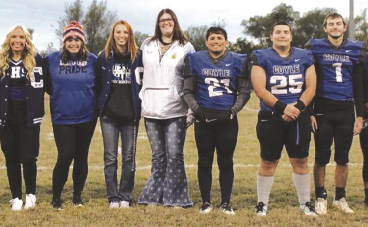 Seniors honored at Coyle Senior Night last Thursday (pictured L-R): Hailey Ruoff, Lindsay Ray, Gracie Balsiger, Ashlee Kelley, Lilly Ritter, Ryleigh Long, Gracey McBane, Joaquin Amaro, Xavier Amaro, Alex Jennings, John Tarbox IV, Jordan Williams and Wyatt Suchan. Photo by Mike Monahan