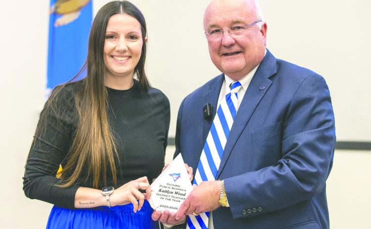 Kaitlyn Wood is recognized as the 2026 District Teacher of the Year for Guthrie Public Schools alongside Superintendent Dr. Mike Simpson during the district’s Teacher of the Year celebration held Feb. 23 at Meridian Technology Center. Photo by Brent Fuchs